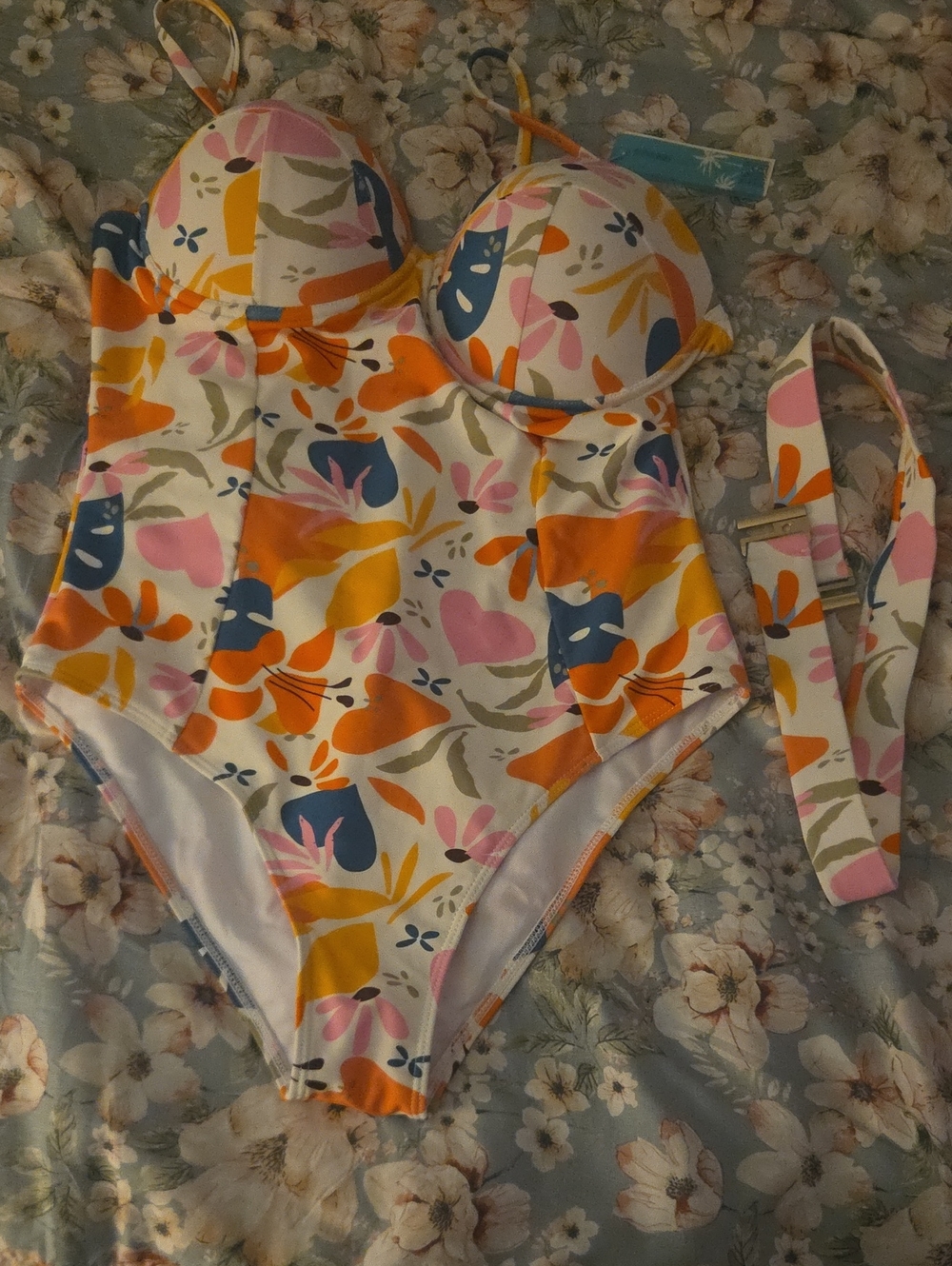 Woman's Floral One-Piece Swimsuit in White with Pink, Orange, and Blue